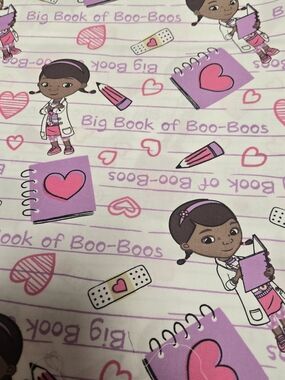 Doc McStuffins Fabric 2 Yards Big Book of Boo Boos Pink Disney Cotton